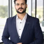serious-indian-professional-business-man-office-portrait-serious-young-ambitious-indian-businessman-project-leader-dressed-367980912